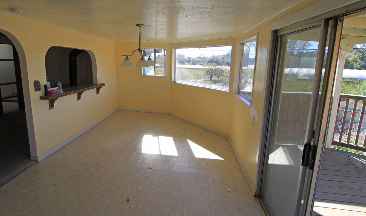 The breakfast area is amazing with so much light and a great covered deck right outside.  Its going to need some paint.