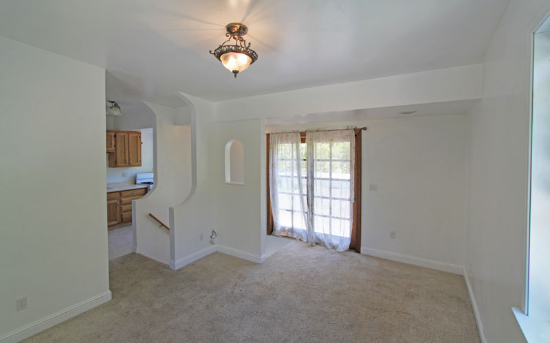 Upstairs contains bedroom or living room, kitchen and full bath.