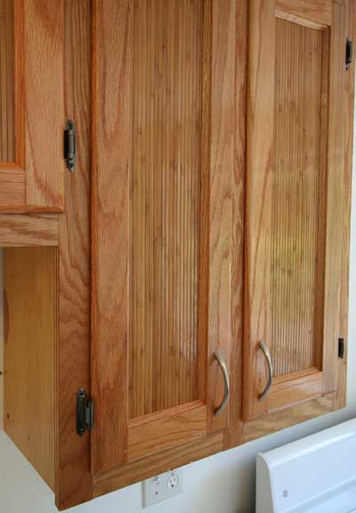 Custom oak cabinets with bamboo inlay.